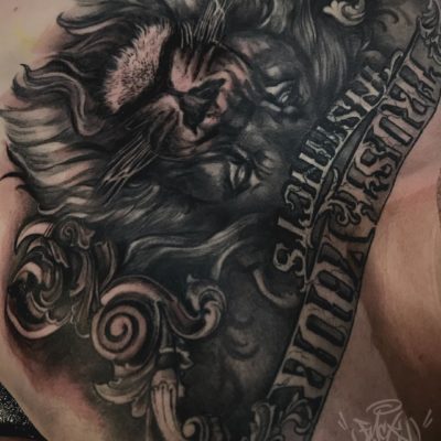 Lion and script chest piece by Yas Vo