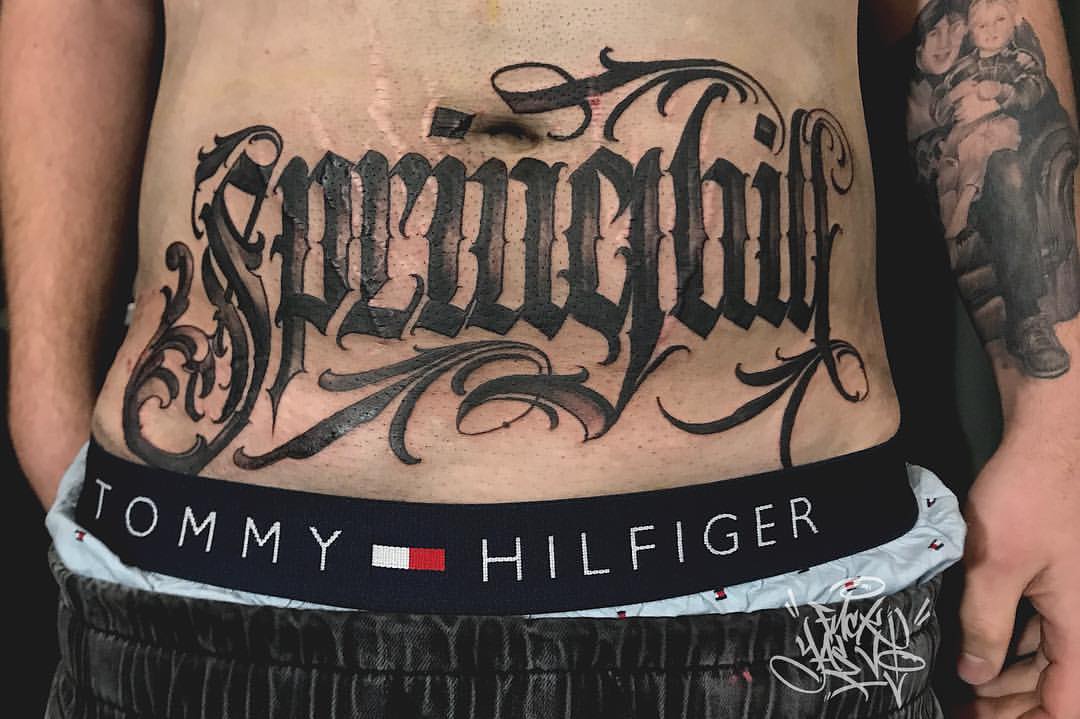 Lettering Belly Tattoo by Gold Rush Tattoo